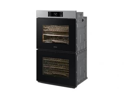 Double wall clearance oven with steam